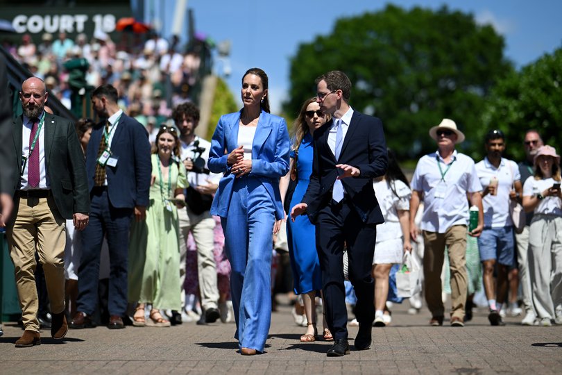 In a royal twist, Princess Kate jumped behind the ticket desk to scan the passes of some incredibly lucky, star-struck fans.