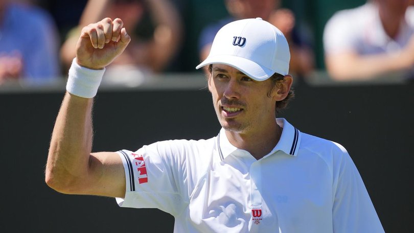 Alex de Minaur savours his second-round success in the southwest London sunshine.