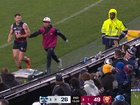 Brisbane star Lachie Neale watches on as Cats fans have their say.
