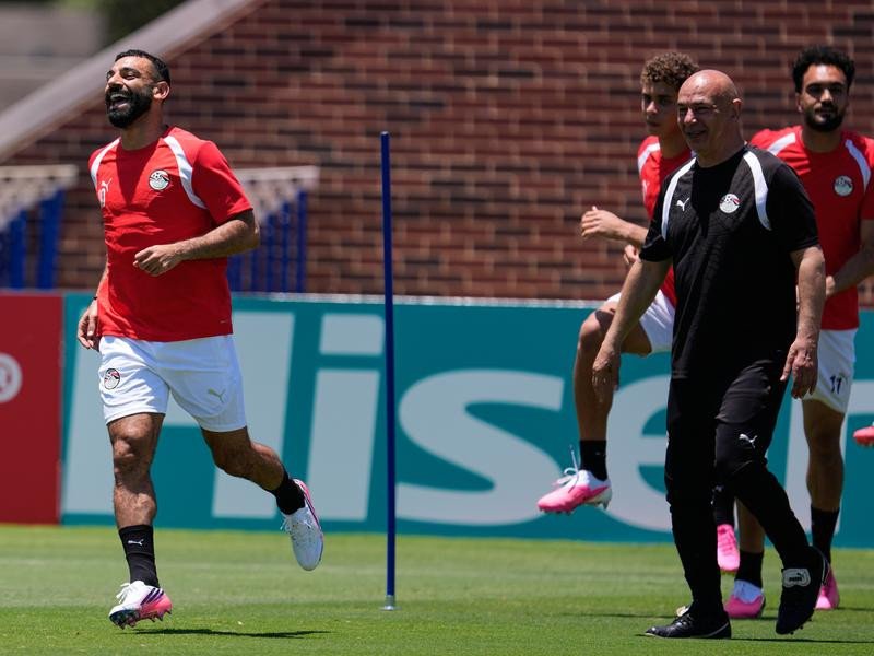 Superstar Mohamed Salah joins Egypt's training session under the watchful eyes of Hossam Hassan. (AP PHOTO)