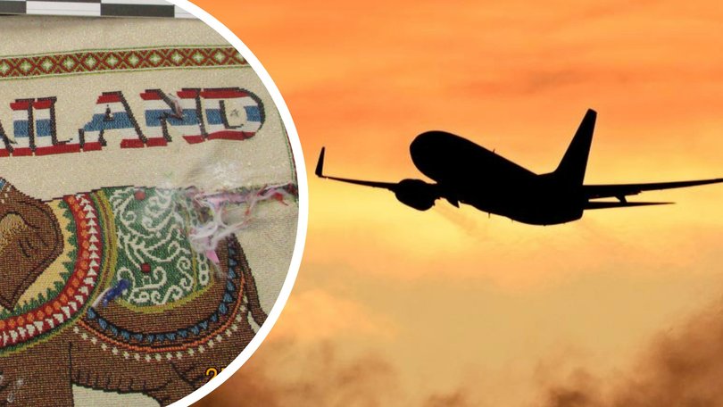 A Thai airline employee has been charged after Australian police allegedly uncovered more than 1kg of heroin concealed inside a dozen tote bags at Melbourne Airport.