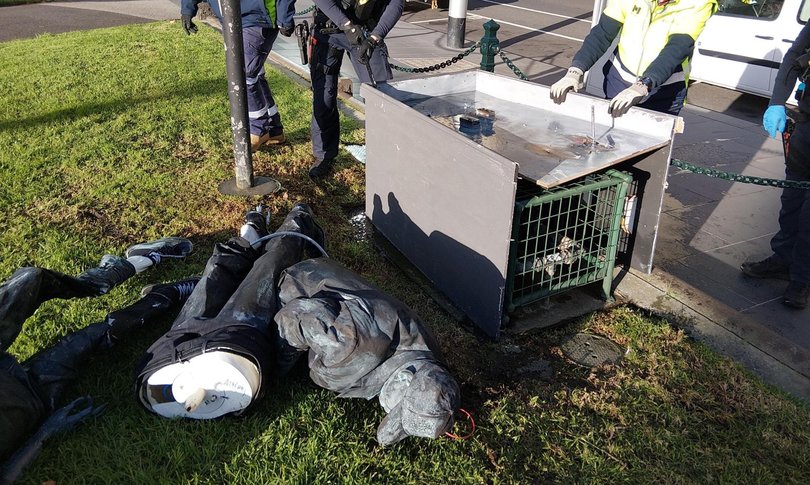 A shocking and explicit statue depicting Donald Trump and Anthony Albanese has been swiftly removed from from outside Parliament, with police now investigating the stunt.