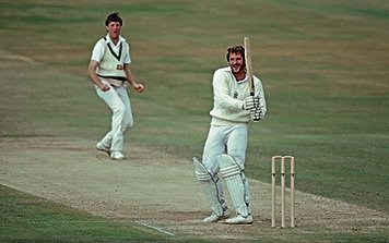 England batsman Ian Botham smiles as he hits out off the bowling of Geoff Lawson in 1981.