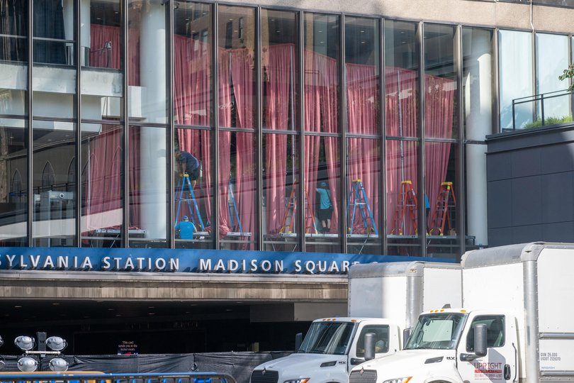 Workers install curtains at Madison Square Garden to shield guests from paparazzi amid widespread speculation that the arena is hosting Taylor Swift and Travis Kelce rumoured wedding.