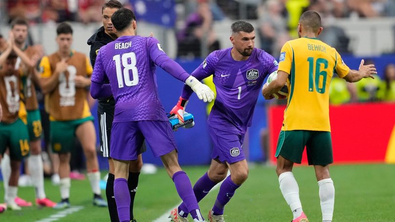 Australia goalkeeper Maty Ryan replaces Patrick Beach for the shootout. (AP PHOTO)