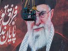 A poster showing the late Ayatollah Ali Khamenei is installed ahead of his funeral ceremonies on July 3, 2026 in Tehran, Iran. 