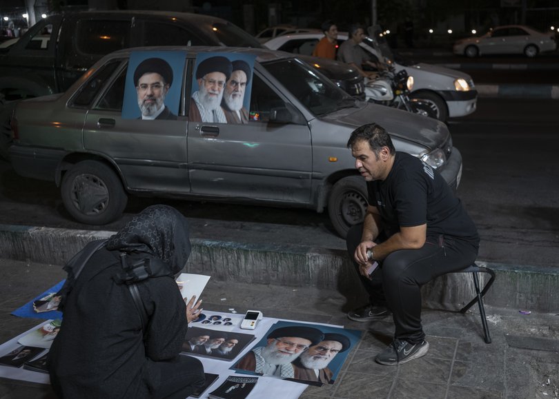 A vendor sells portraits of Iran’s supreme leaders, including Ayatollah Ali Khamenei, in Tehran, on Friday, July 3, 2026.