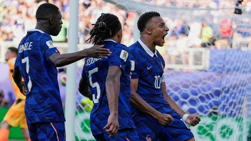France superstar Kylian Mbappe (r) reacts after scoring from the penalty spot against Paraguay. (AP PHOTO)