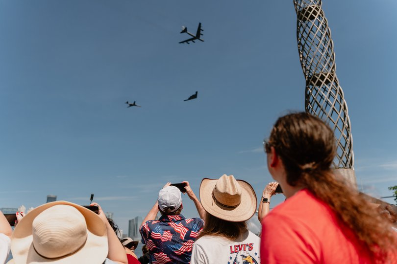 Spectators watch the International Aerial Review from Rockefeller Park in New York, July 4, 2026. 