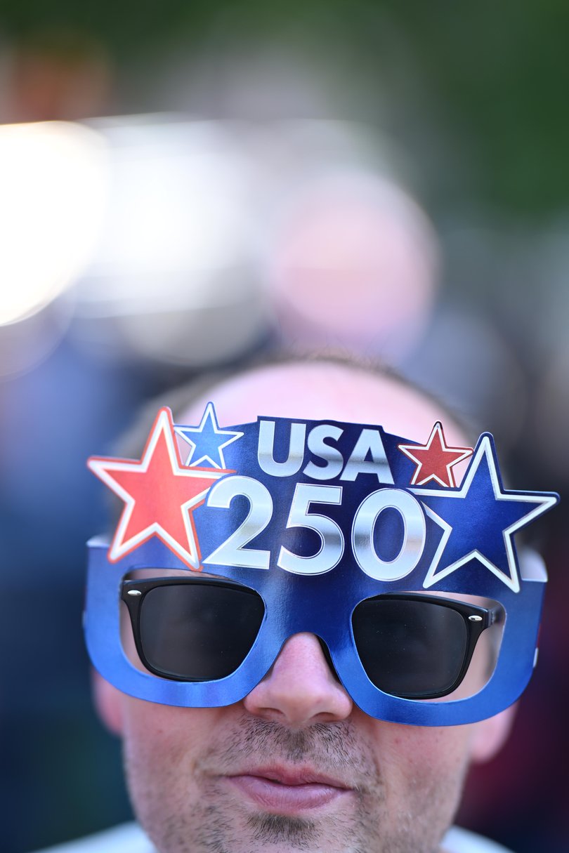 Jim Freemyer, 37, wears USA 250 sunglasses during the Greeley Stampede's Independence Day parade in Greeley, Colo., July 4, 2026. 