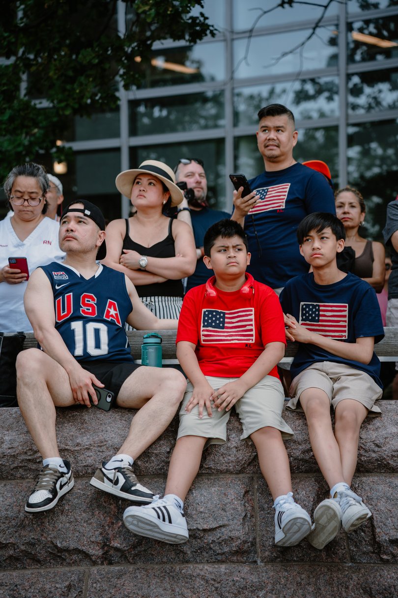 People watch the International Parade of Sail and International Aerial Review from the Battery Park City Esplanade in New York, July 4, 2026. 