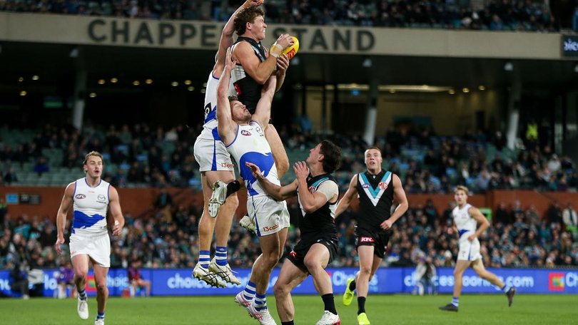 Mitch Georgiades bagged three goals and this soaring mark as Port Adelaide beat North Melbourne.