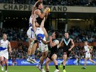Mitch Georgiades bagged three goals and this soaring mark as Port Adelaide beat North Melbourne. 