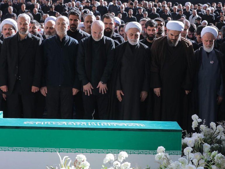 Iranian officials and three sons of Ali Khamenei have prayed at the former leader's funeral. (EPA PHOTO)