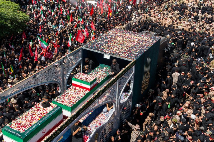 TEHRAN, IRAN - JULY 6: The coffins of Iran's slain Supreme Leader Ayatollah Ali Khamenei and his family members who were killed alongside him are transported during their funeral procession on July 6, 2026 in Tehran, Iran. Khamenei and members of his family were killed on February 28 during U.S.-Israeli strikes at the beginning of the war, bringing an end to his 36-year rule over Iran. A multi-city state funeral will be held over six days before his body is laid to rest on July 9, in his hometown of Mashhad, Iran. (Photo by Majid Saeedi/Getty Images)