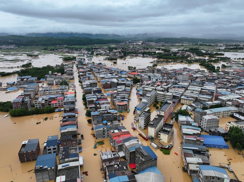 Authorities in the southern region of Guangxi reported more than 900 snakes were freed from a farm and are now loose in the floodwaters.