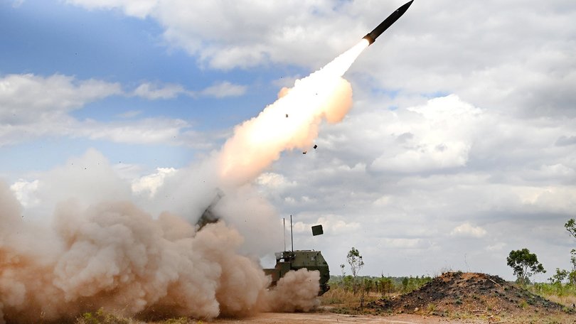 An Australian High Mobility Artillery Rocket System fires a Precision Strike Missile.