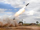 An Australian High Mobility Artillery Rocket System fires a Precision Strike Missile.