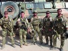 SAS team Bravo 3 immediately before a mission in Shah Wali Kot, Afghanistan, that would cost Trooper Jason Brown his life. Andy White is in the centre.