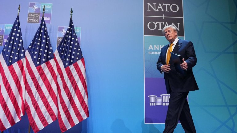 US President Donald Trump has spoken of NATO unity after earlier criticising alliance members. 