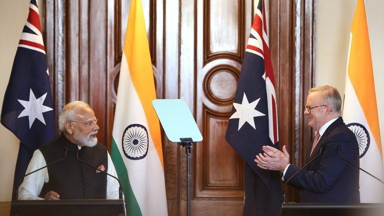 Australian Prime Minister Anthony Albanese, right, reacts as Indian Prime Minister Narendra Modi speaks during a joint press conference in Melbourne, Australia, Thursday, July 9, 2026. (AP Photo/Hamish Blair)