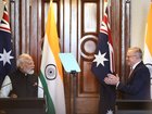 Australian Prime Minister Anthony Albanese, right, reacts as Indian Prime Minister Narendra Modi speaks during a joint press conference in Melbourne, Australia, Thursday, July 9, 2026. (AP Photo/Hamish Blair)
