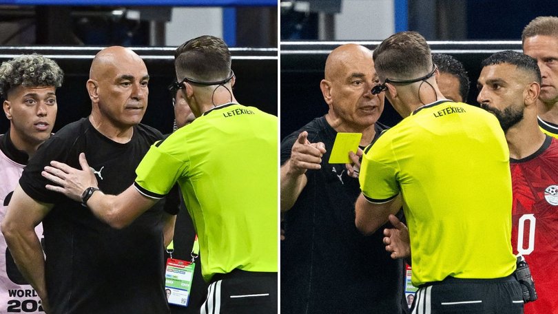 Egypt coach Hossam Hassan gets a yellow card from the ref during the heated clash with Argentina. 