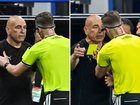 Egypt coach Hossam Hassan gets a yellow card from the ref during the heated clash with Argentina. 