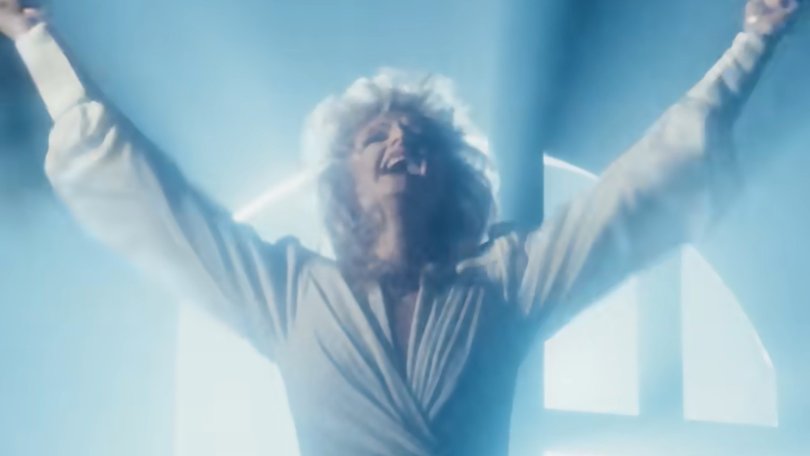 The video had Tyler belting out the ballad from a backlit balcony.