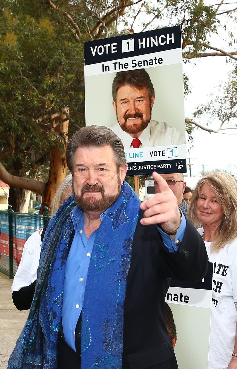Derryn Hinch, a candidate for the senate representing Victoria as the head of 'Derryn Hinch's Justice Party' arrives to vote in the national election at a polling station at Albert Park Primary School on July 2, 2016 in Melbourne, Australia.