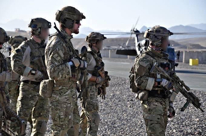 Corporal Ben Roberts-Smith (face unobscured) with his SAS unit in southern Afghanistan in 2010 before the Battle of Shah Wali Kot, for which he was awarded the Victoria Cross. Picture: Unknown