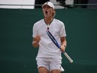 Cruz Hewitt roars after winning a point en route to the final of the Wimbledon boys' event. 