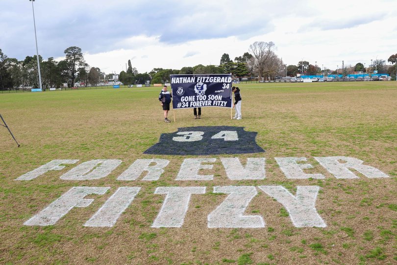 Signage on the ground at a memorial service for Nathan, Fitzy, Fitzgerald at Epping Recreation Reserve, the home ground for the Epping Football Netball Club.