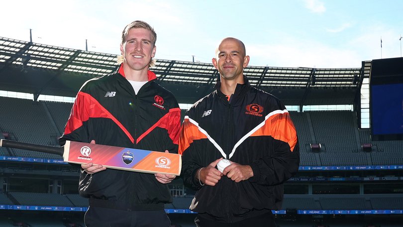 Will Sutherland of the Renegades and Ashton Agar of the Scorchers pose for a photograph.