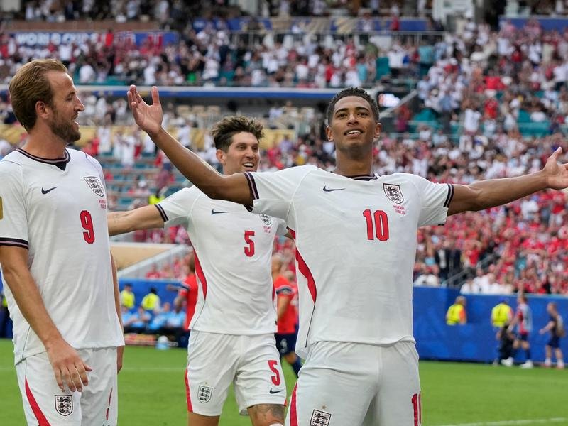 Jude Bellingham (r) is the toast of England after their World Cup quarter-final win over Norway. (AP PHOTO)