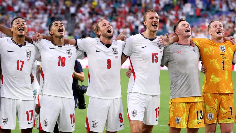 England players celebrate their win.