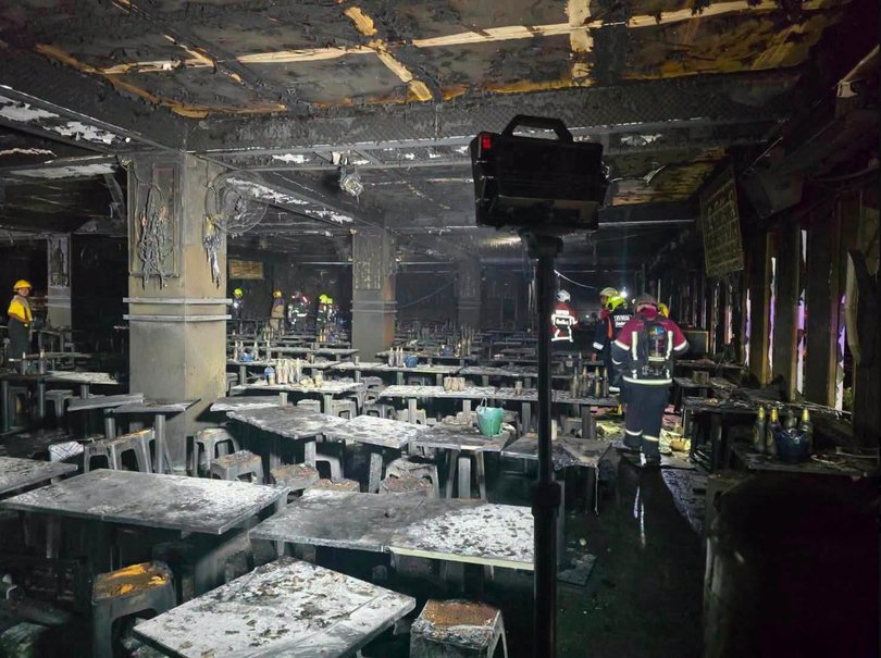 Photos from the scene show charred tables and chairs alongside extensive damage up walls inside the pub.