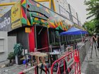 Dozens of Thai forensic officers are combing for clues about what caused the deadly fire. (AP PHOTO)
