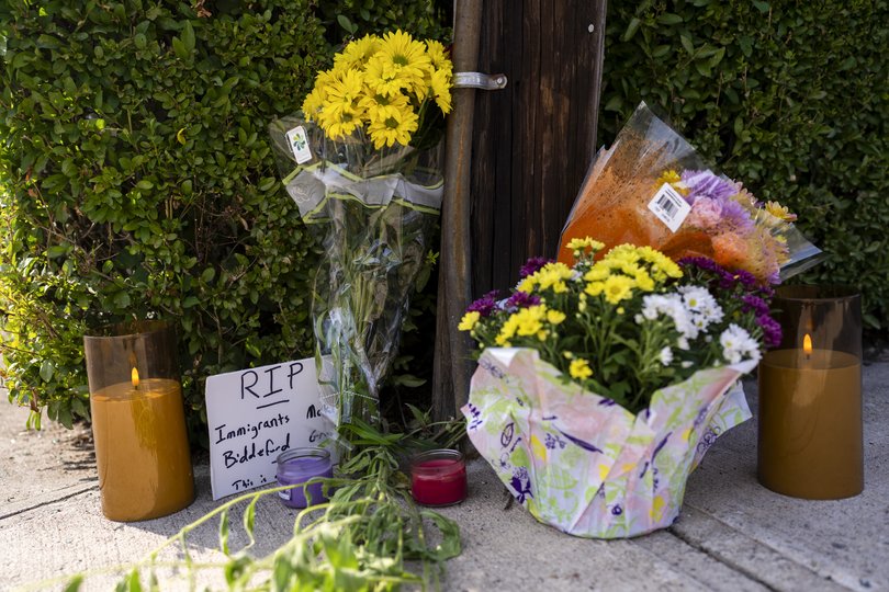 Flowers at a makeshift memorial near the site of a shooting involving a federal immigration agent in Biddeford, Maine, on Monday, July 13, 2026. A federal immigration agent shot and killed an individual in a vehicle on Monday morning in the coastal city of Biddeford, Maine, according to the state attorney general’s office. (Christopher Capozziello/The New York Times)