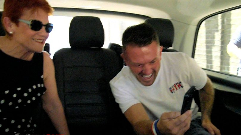 One Nation leader Pauline Hanson and Tommy Robinson share a laugh during their time together in Britain.