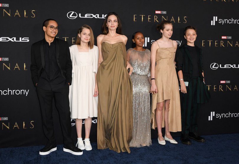 Angelina Jolie and her children (L-R) Maddox Jolie-Pitt, Vivienne Jolie-Pitt, Zahara Jolie-Pitt, Shiloh Jolie-Pitt and Knox Jolie-Pitt arrive for the world premiere of Marvel Studios' "Eternals” in 2021.