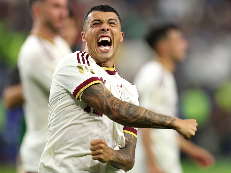 Spain’s Pedro Porro celebrates.