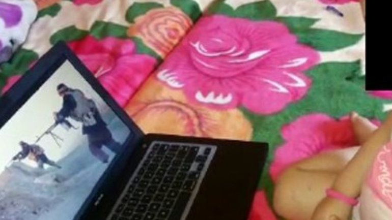 An image alleged to depict Rayann El Houli showing her child ISIS propaganda. Supplied/ Magistrates Court of Victoria.