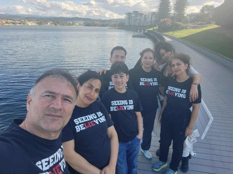 Hidden’s family gathered before scattering his ashes, wearing matching shirts bearing his motto: Seeing is Believing.