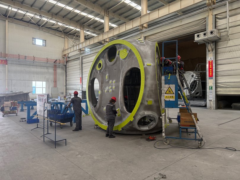 Workers build steel hubs for large wind turbines at a factory in Tongliao, in China’s Inner Mongolia. Renewable energy exports have helped bolster China's economy.
