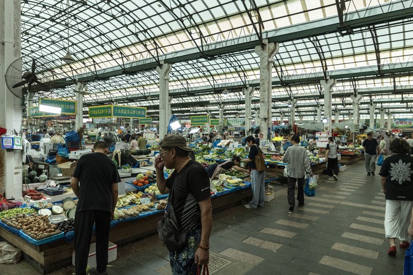 Shoppers at a market in Shanghai. China rolled out consumer subsidies to boost spending after its property downturn.