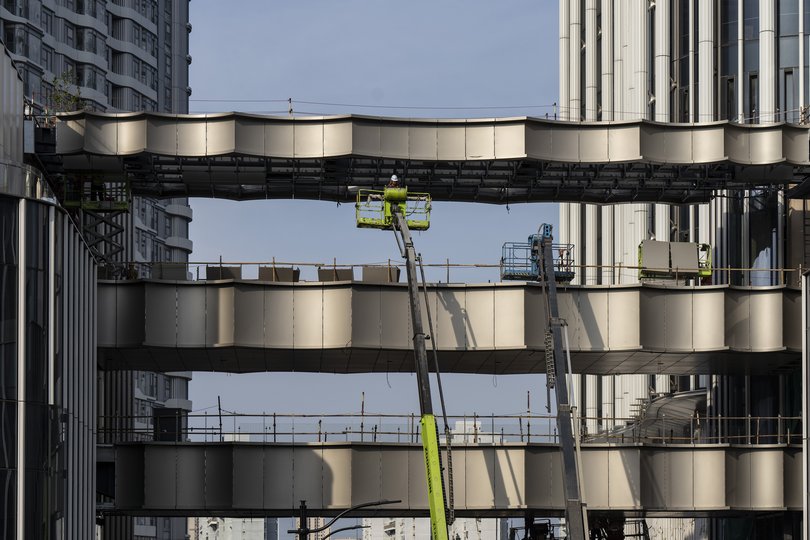 Construction in Shanghai. Millions of construction workers lost jobs after China’s property market collapsed.