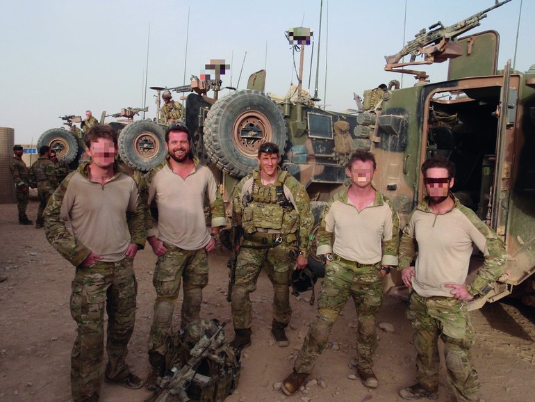 SAS team Bravo 3 at Patrol Base Buman, Afghanistan, in 2010. Andy White is second from left. Jason Brown is in the centre.