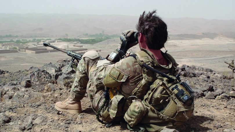 SAS Trooper Andy White in Shah Wali Kot, Afghanistan, with a sniper rifle and binoculars the day after Jason Brown was killed.