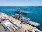 HMAS Perth moves into position in front of HMAS Ballarat.